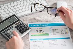 Credit report documents on table