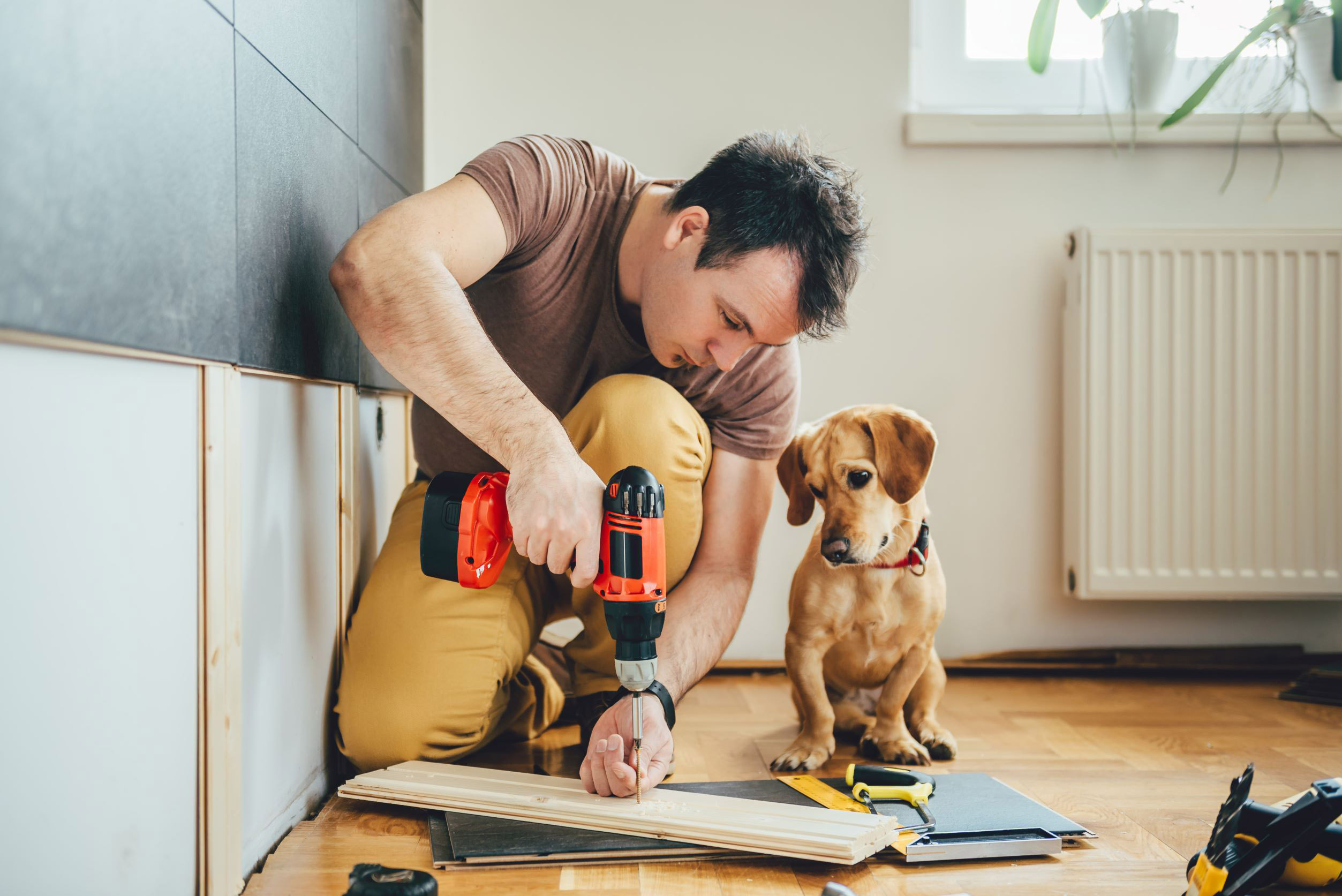 Man with dog - click for home equity line of credit